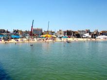 Druk strand, Uisge Beatha, Zeilen, Watersport Druk strand, Uisge Beatha, Zeilen, Watersport